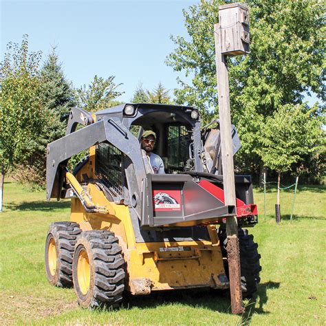 skid steer tree puller video|skid steer tree puller attachment.